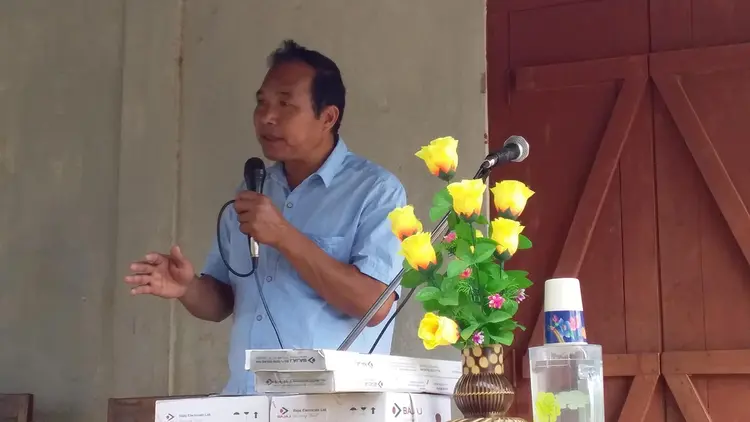 Mr. Sunmith G. Momin delivering the message at Rongmasu Mission Field